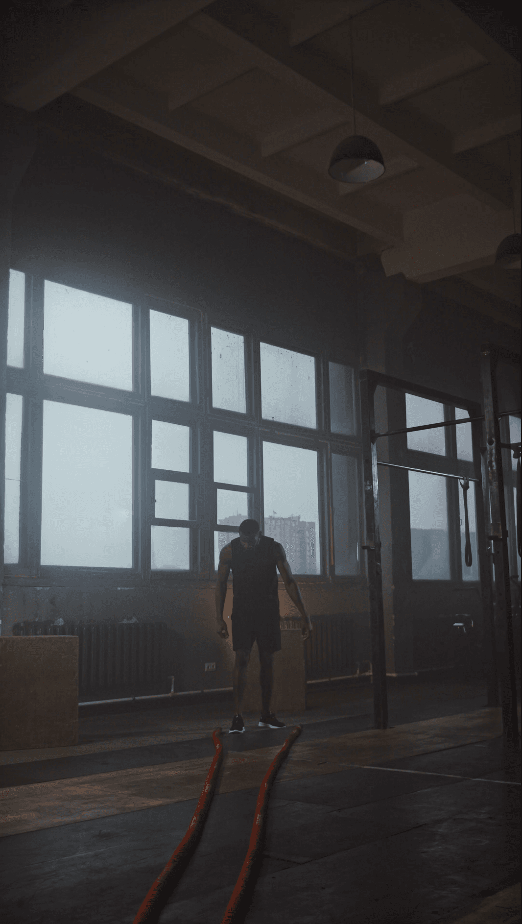 An athlete training alone in an empty gym